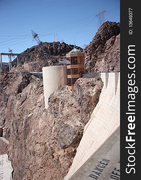 Hoover Dam Visitor Center with under construction bridge and power tower.