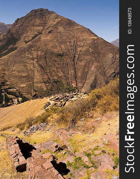 A view across ancient Inca terraces to ruins near the sacred valley in Peru, South America. A view across ancient Inca terraces to ruins near the sacred valley in Peru, South America