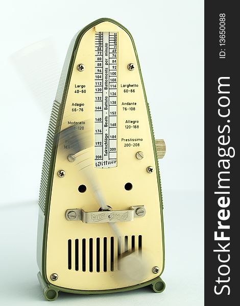 Antique green & yellow Wittner Taktell mechanical metronome. Antique green & yellow Wittner Taktell mechanical metronome