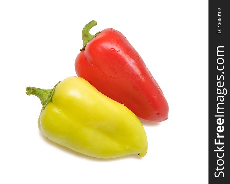 Red and yellow sweet paprika on white background