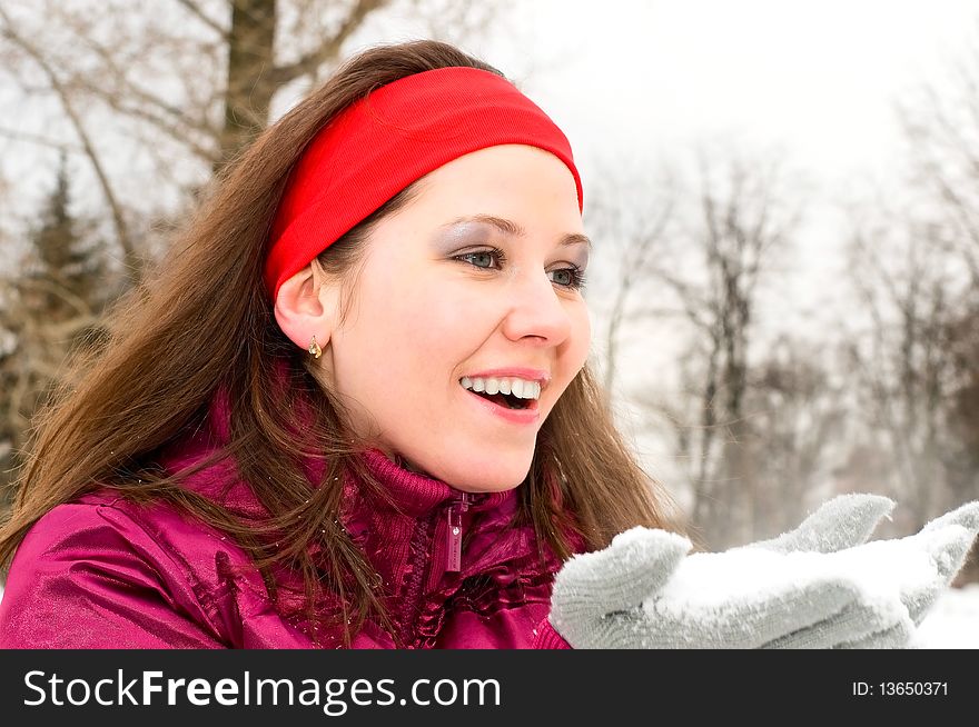 Portrait of young smiling woman with snow. Portrait of young smiling woman with snow