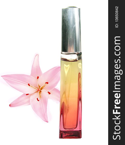 Red luxury perfume with lily flower on background. Red luxury perfume with lily flower on background