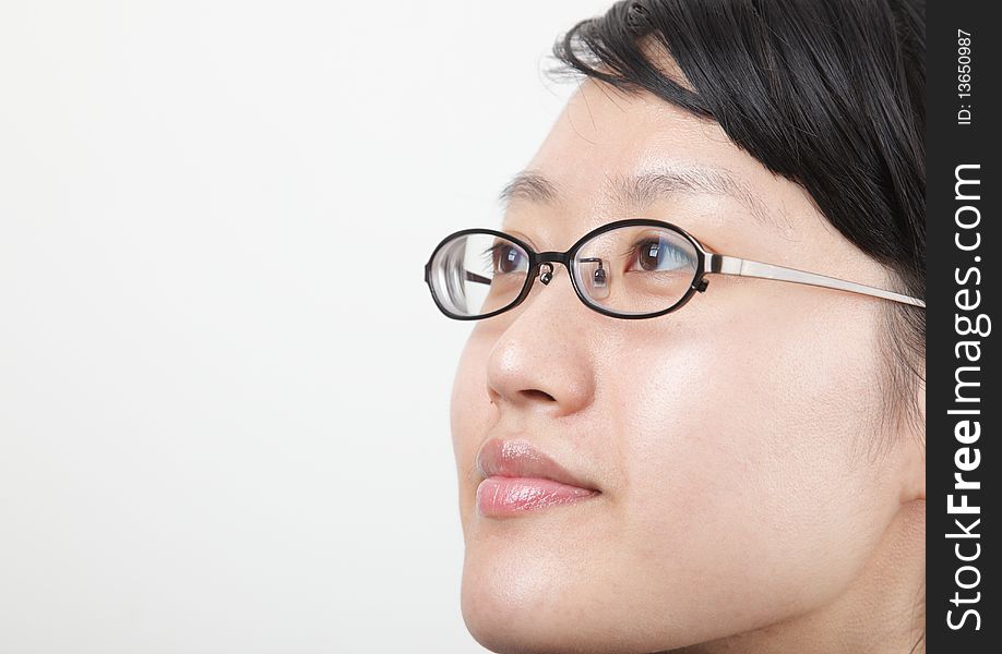 Attractive young lady with eye glass