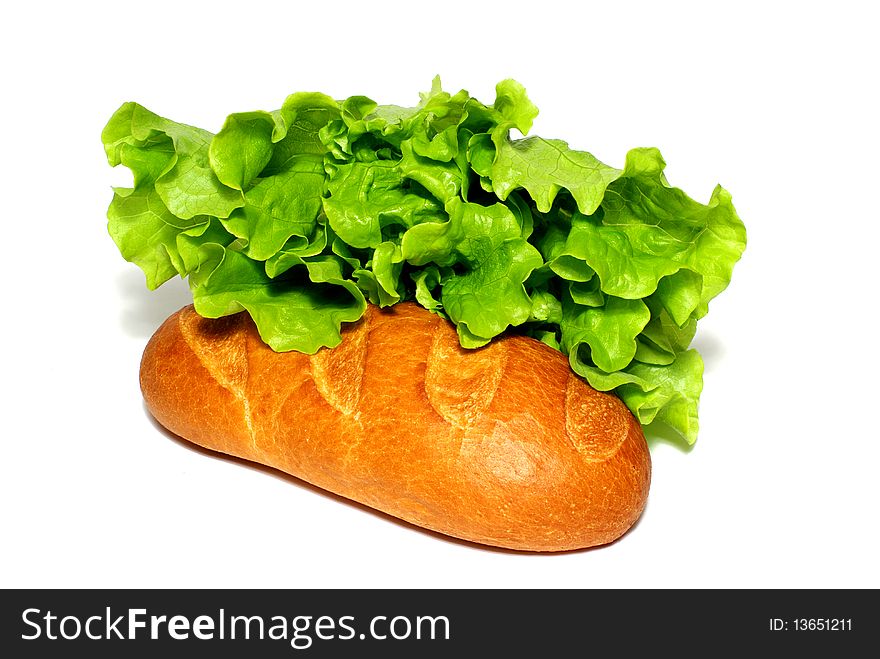Fresh salad with a bun on a white background. Fresh salad with a bun on a white background