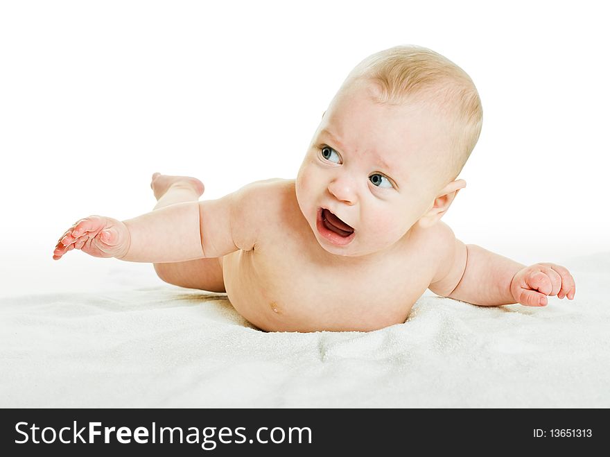 Playing baby is on abdomen and white background. Playing baby is on abdomen and white background