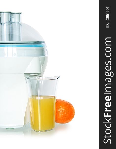 Modern electric juicer and glass of orange juice isolated on white background with clipping path. Modern electric juicer and glass of orange juice isolated on white background with clipping path