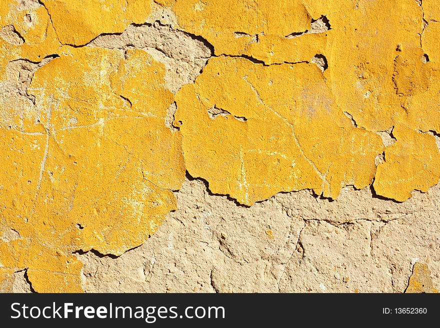 Grunge Cement Wall and Yellow Plaster