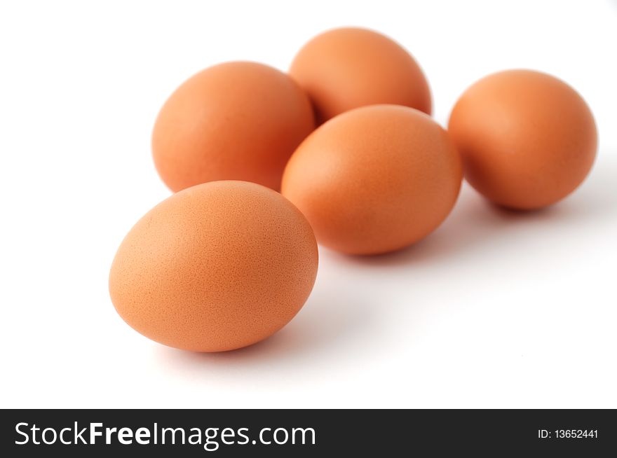 Group of chicken eggs isolated on white