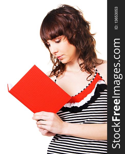 Lovely brunette reading a red book on white
