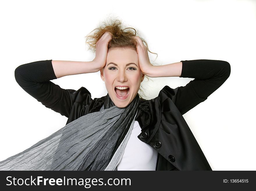 Young fashionable woman shouting loudly over white