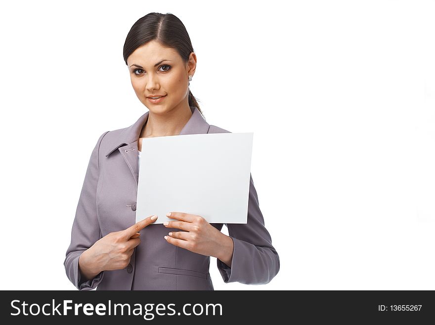 Portrait of a young business woman pointing on the paper she is holding. Portrait of a young business woman pointing on the paper she is holding