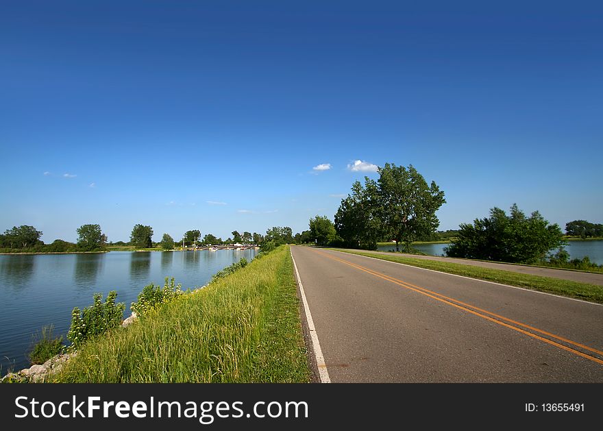 Scenic drive by the lake in summer time