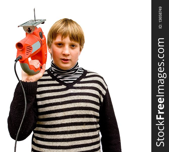 Boy with a fret saw on a white background. Boy with a fret saw on a white background