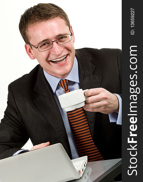 Handsome young businessman with coffee cup