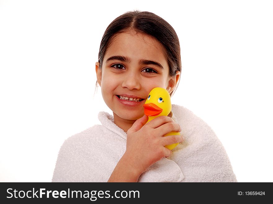Cute young child holding rubber duck isolated on white. Cute young child holding rubber duck isolated on white
