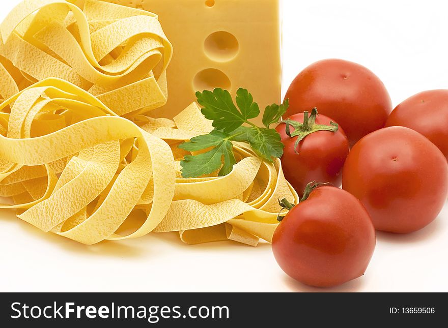 Bright tomatoes, cheese piece, parsley, paste  isolated on white. Bright tomatoes, cheese piece, parsley, paste  isolated on white