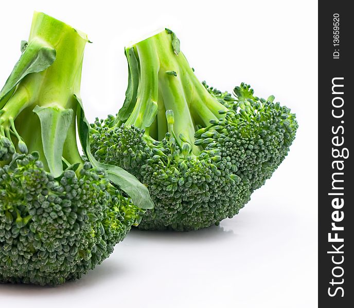 Two branches of cabbage of a broccoli on a white background