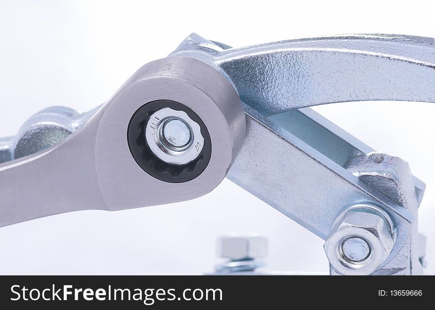 Spanner, wrench and silver bolt on white background close up. Spanner, wrench and silver bolt on white background close up