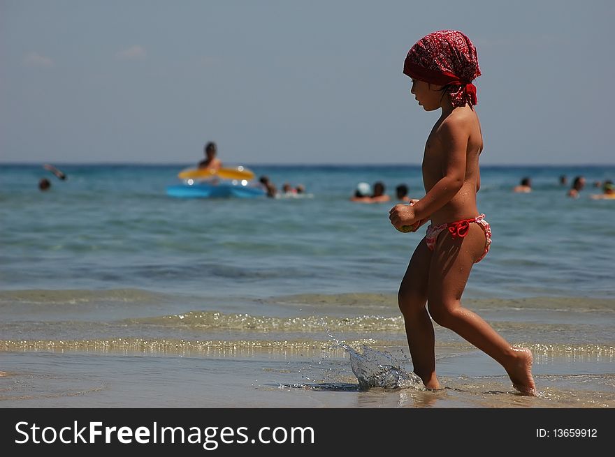 A pretty little girl on the beach. A pretty little girl on the beach