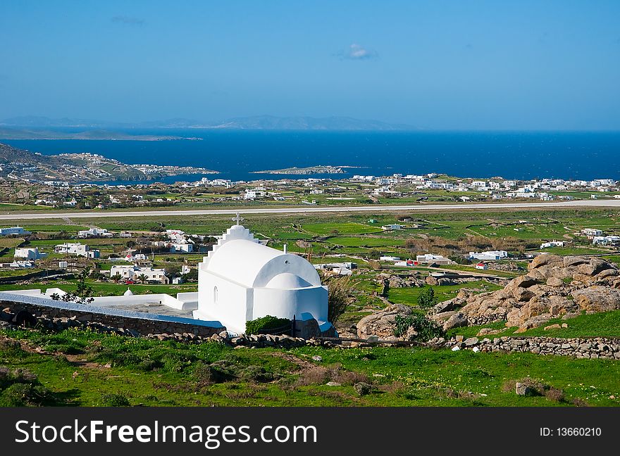 The white buildings and churches on the Mykonos.