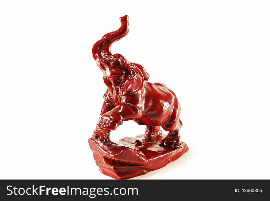 Statuette of Indian ceramic elephant isolate on a white background. Statuette of Indian ceramic elephant isolate on a white background