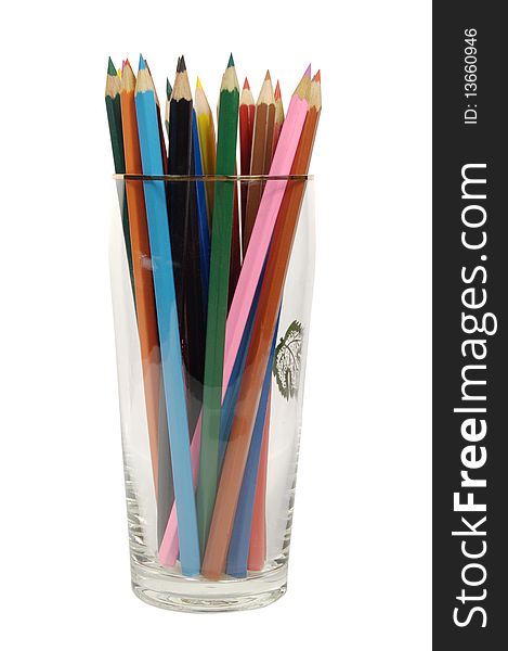Colour pencils in a glass glass separately on the white. Colour pencils in a glass glass separately on the white
