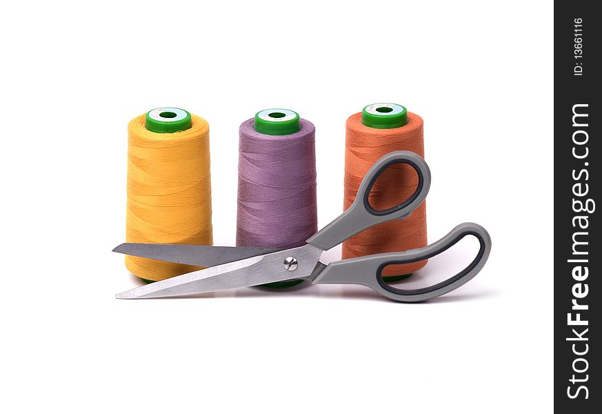 Colored spool and scissors