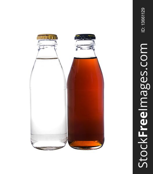 Two glass bottles filled with a liquid isolated on a white background