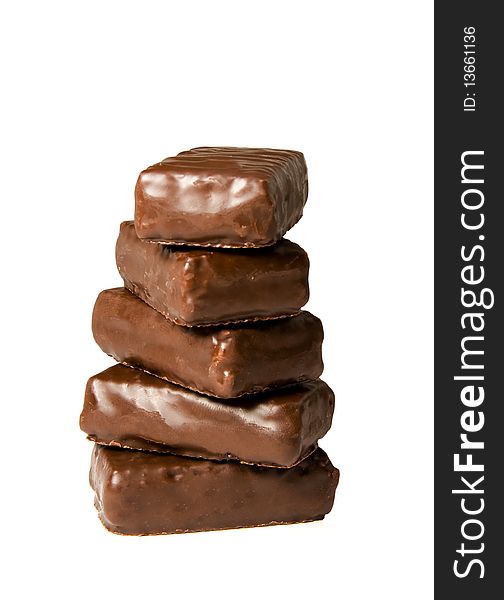 Five chocolates isolated on a white background