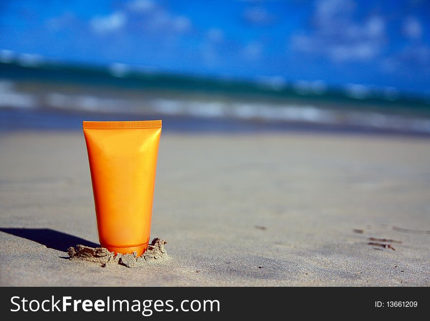 Tube with sun protection on beach of ocean