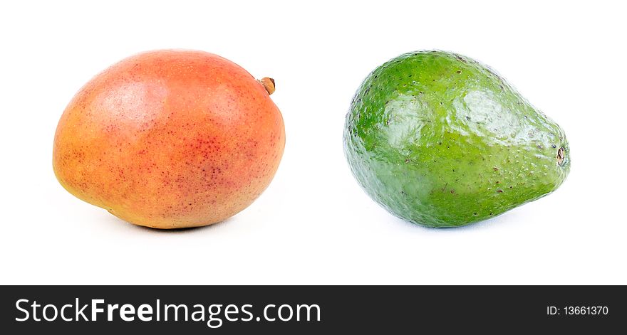 Mango and  avocado isolated on white. Mango and  avocado isolated on white