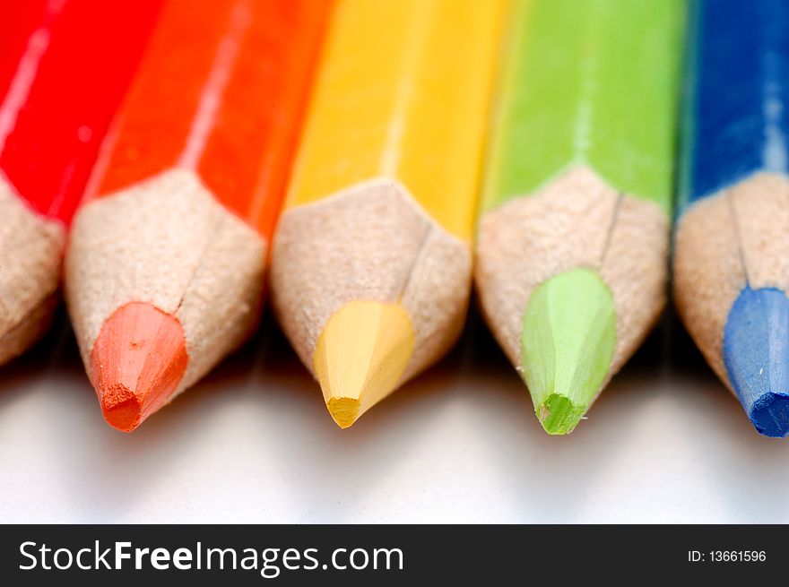 Various Color pencils on white background