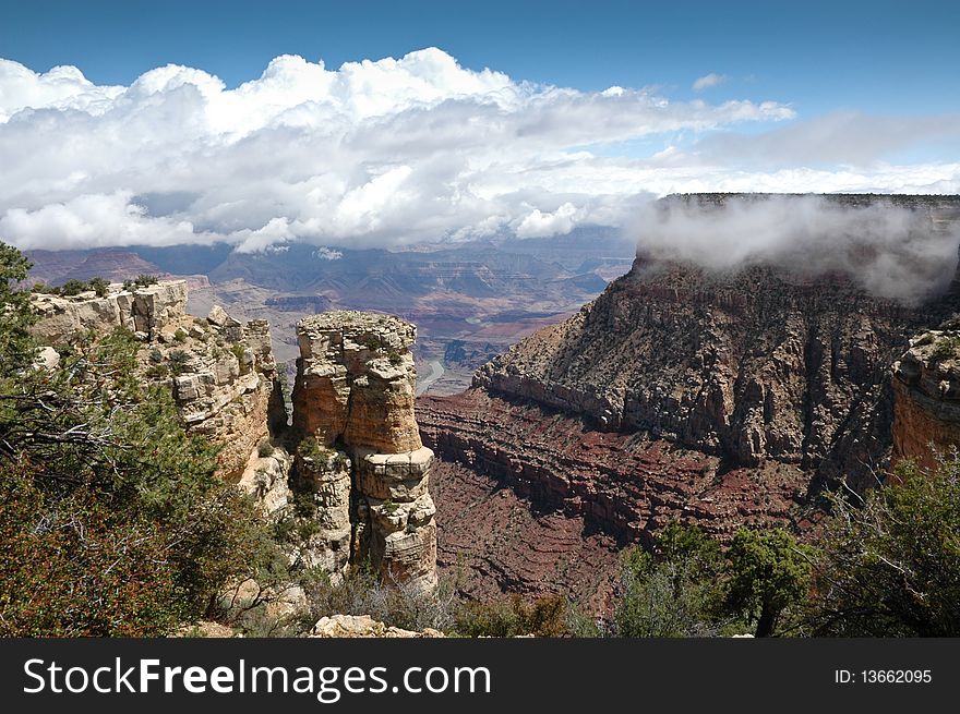 View of the grand canyon with the colorado river and clouds