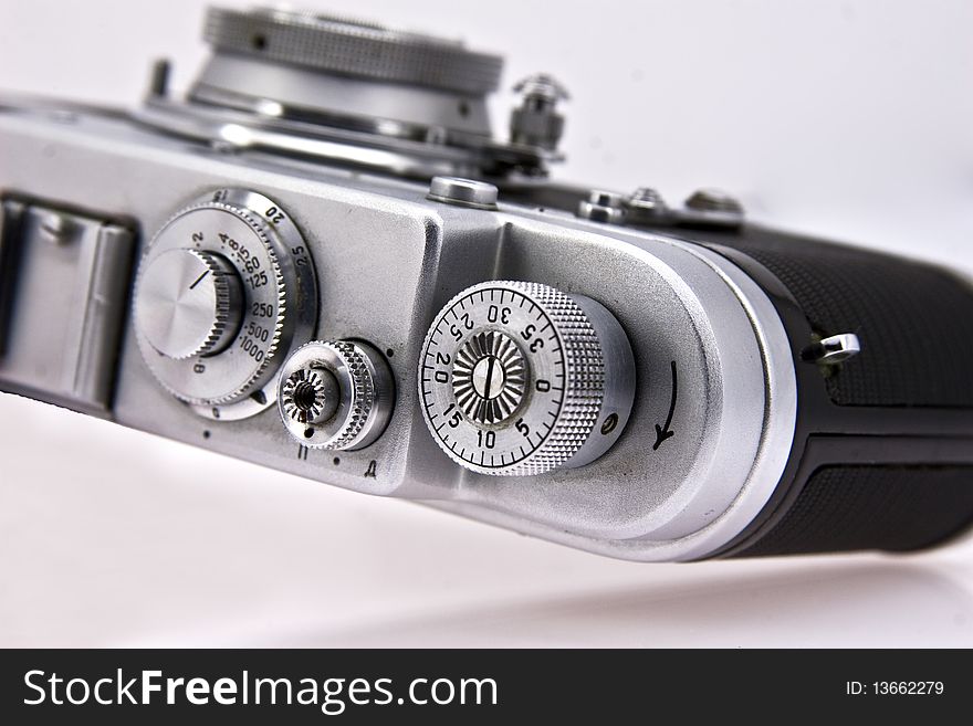 Old film mechanical rangefinder camera. Old film mechanical rangefinder camera