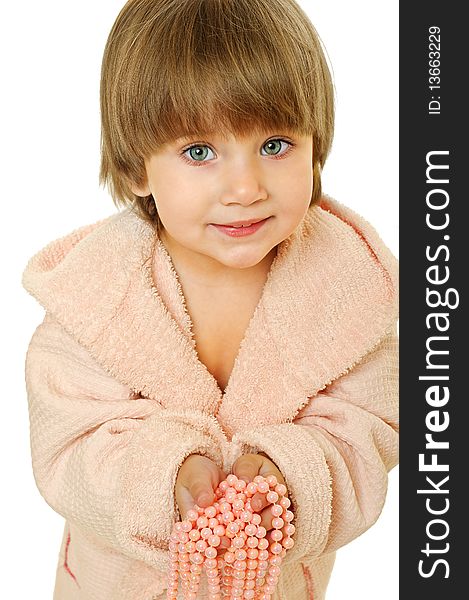 Little girl in pink bathrobe with beads. Little girl in pink bathrobe with beads