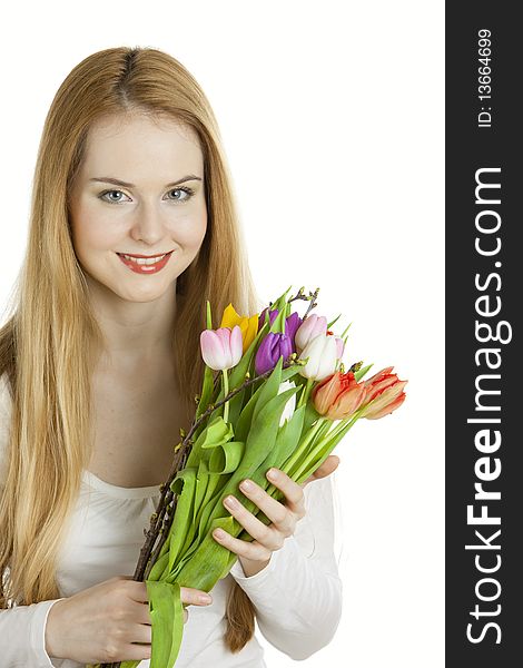 Portrait of young woman with tulips