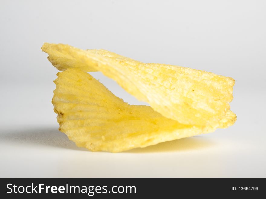 Two chips sncaks on white background with shadow. Two chips sncaks on white background with shadow