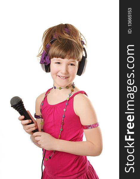 Beautiful girl with a microphone isolated on a white background. Beautiful girl with a microphone isolated on a white background