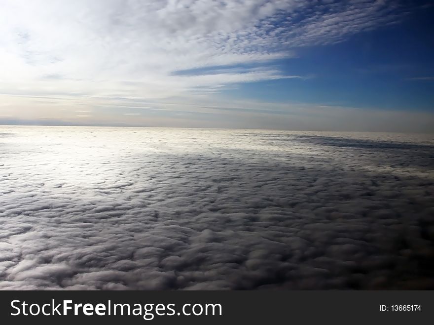 Beautiful sky and clouds viewed from a plane that flight at ten thousand meters high. Beautiful sky and clouds viewed from a plane that flight at ten thousand meters high