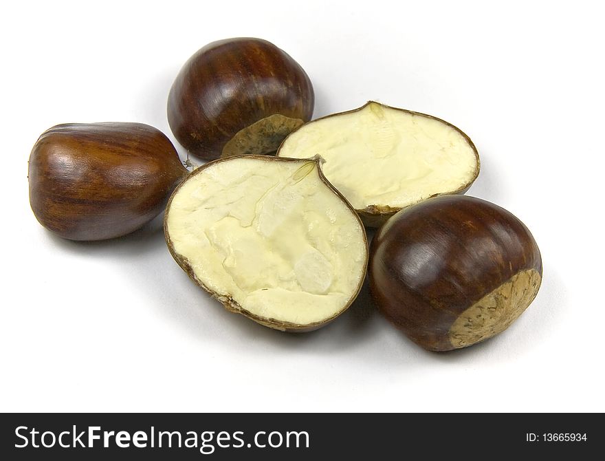 Edible chestnuts (castanea sativa) isolated on white