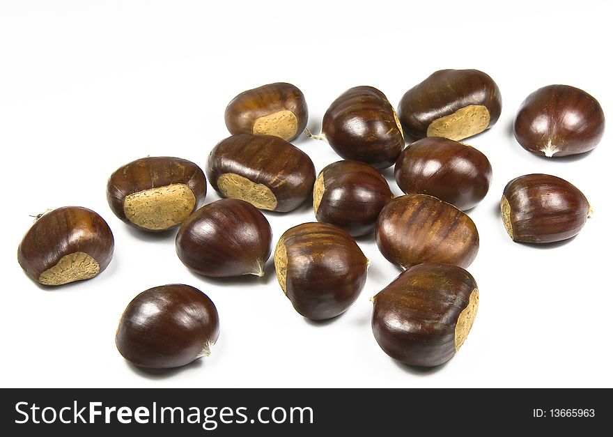 Chestnuts (castanea sativa) on white background