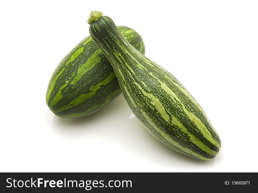 Green zucchinis on white background, clipping path