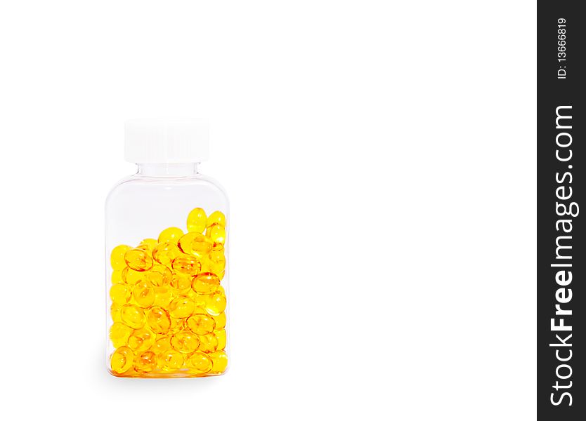 The vial with pills on a white background.