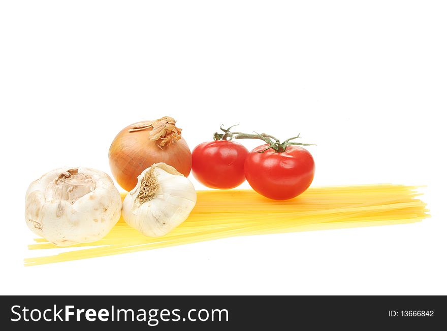 Spaghetti tomatoes, mushroom, garlic and onion isolated on white. Spaghetti tomatoes, mushroom, garlic and onion isolated on white