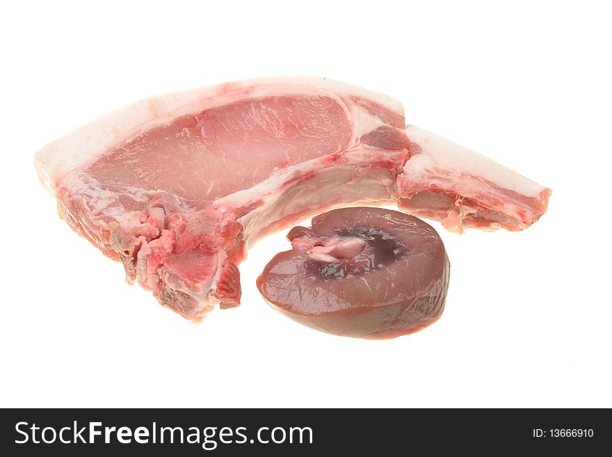 Raw pork chop and pigs kidney isolated on white. Raw pork chop and pigs kidney isolated on white