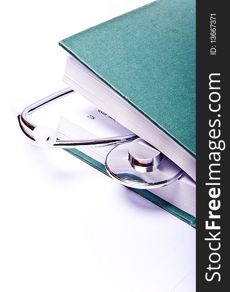 Medical book on white background