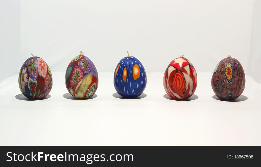 A series of colored candles in the shape of egg. Handmade by artisans. Suitable for Easter. A series of colored candles in the shape of egg. Handmade by artisans. Suitable for Easter.