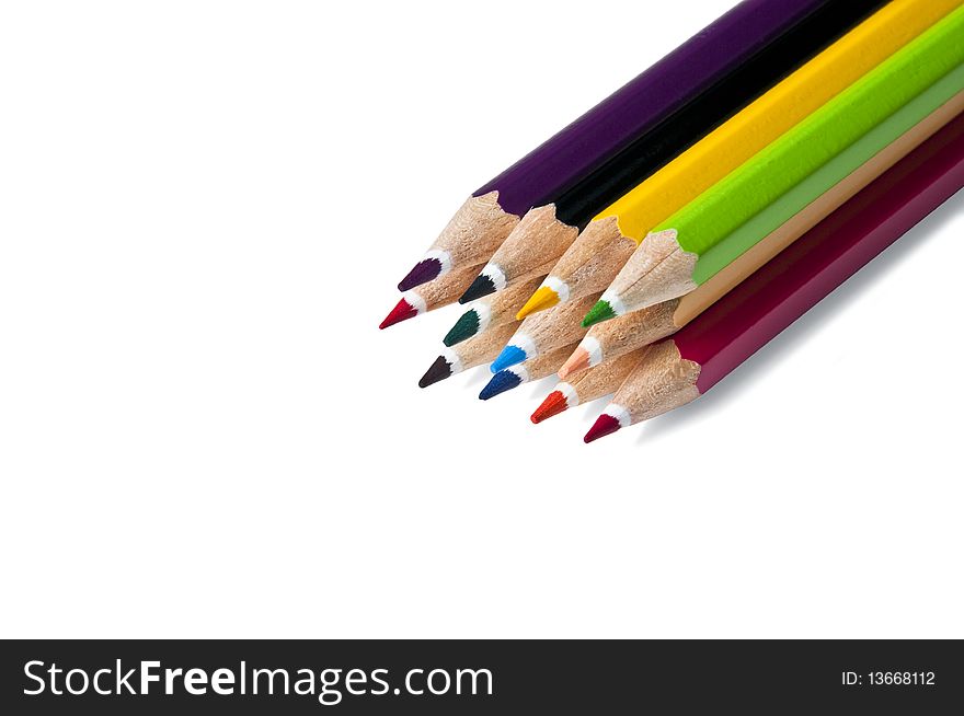 Stack of color pencils on white background