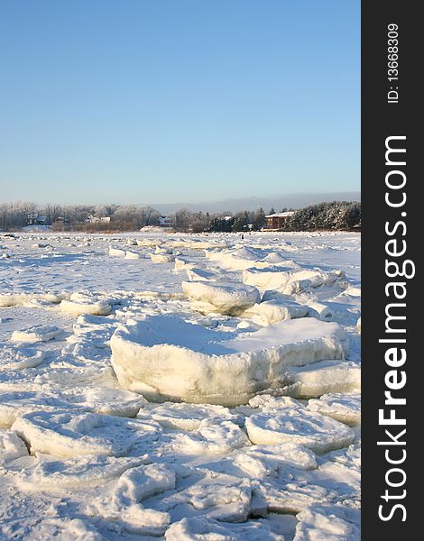 Beautiful winter landscape in a cold sunny day, near city of Tallinn in Estonia. Big parts of frozen ice on Baltic Sea. Beautiful winter landscape in a cold sunny day, near city of Tallinn in Estonia. Big parts of frozen ice on Baltic Sea.