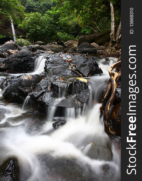 Charming water fall in the Thailand